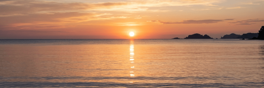 Peaceful sunrise over calm sea