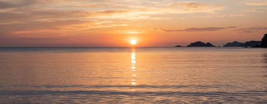 Peaceful sunrise over calm sea